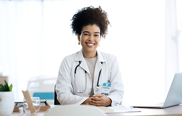 Image showing Professional, office and portrait of woman doctor at medical administration desk for medicine information and working. Confident, healthcare and happy worker with smile at surgeon table for insurance