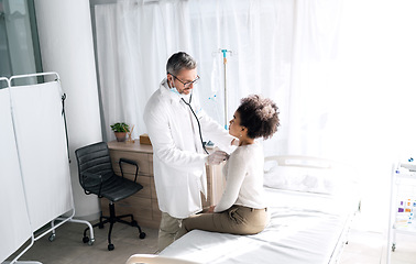 Image showing Stethoscope, hospital people and doctor check heartbeat, breathing or help with asthma lung virus, tuberculosis or health test. Clinic, cardiovascular exam and professional nurse support for patient