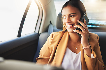 Image showing Woman in taxi with smile, phone call and travel on urban commute in communication on drive. Transport, car or cab ride, girl in happy conversation on cellphone for schedule or agenda on road to work.