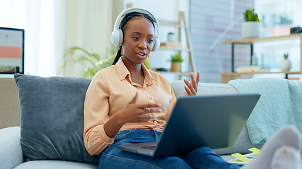 Image showing Video call, laptop and black woman doing remote work presentation on couch in a home on webinar. Sofa, information and freelancer working with online technology in apartment for consultation