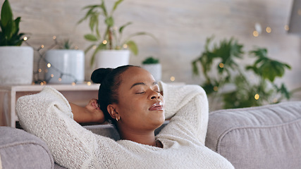 Image showing Relax, sleeping and black woman nap on sofa for satisfaction, free time and weekend at home. Apartment, dreaming and tired African person resting in living room on couch for calm, carefree and chill