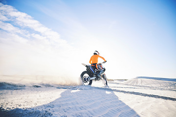 Image showing Desert, back and man on motorbike outdoor to race, adventure or travel for extreme sport on mockup space. Off road, sand and driver on motorcycle on dirt in nature for action, competition and freedom