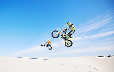 Image showing Motorbike, people and sports with exercise, challenge and performance with safety, desert and workout. Athletes, sand or bikers with competition, practice or cycling with exercise, training or energy