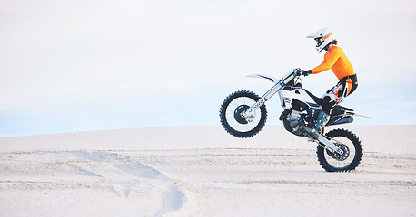 Image showing Motorbike, person and sports with fitness, training and challenge with safety, desert and energy. Athlete, sand and biker with mockup, practice and cycling with exercise, travelling and adventure