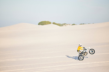 Image showing Moto, bike and rider in desert for sports, health and fitness in Dubai with training for competition. Person, fearless and road for adventure while travel, vacation or holiday for wellness in summer