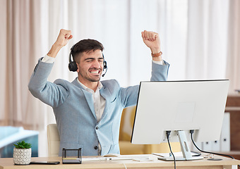 Image showing Man, employee and headset with computer in celebration of sale, customer service or target in office. Person, agent and call centre for success, achievement or victory in telemarketing, deal or bonus