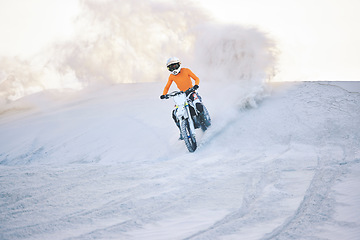 Image showing Motorcycle, desert dust and moto sport with athlete outdoor on hill with race, journey and adventure. Extreme, workout and motorbike challenge of person with driving exercise and training in Dubai