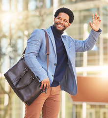 Image showing Hand, wave and man in city for taxi, transportation commute travel on street in cbd for business, office or buildings. Businessman, sign and call attention of cab, driver and vehicle service in town