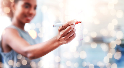 Image showing Woman, hand and writing on glass board, banner for planning or brainstorming ideas, pen for notes and project agenda. Schedule, strategy and innovation in office, bokeh and mockup space with goals