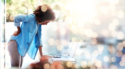 Image showing Laptop, backache and posture with a business woman holding her spine in pain at the office for work. Computer, space and a young design employee feeling an injury to her body on double exposure