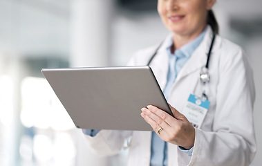 Image showing Woman, doctor closeup and tablet with hospital, healthcare and wellness data in clinic. Technology, online results and research and medical professional working and planning on internet at job