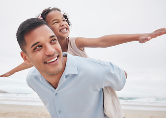 Image showing Beach, fly or happy dad with child in nature to enjoy a family holiday vacation or game in New Zealand. Piggy back, plane or excited father playing at sea with a kid or girl to relax or bond together