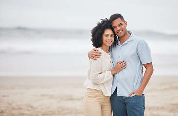 Image showing Couple, hug and portrait on beach, smile and love in marriage, getaway and holiday for bonding. Mexican people, happy and relax at ocean or sea, vacation and travel or trip, summer and peace by waves