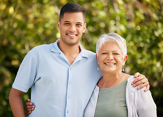 Image showing Man, senior mom or portrait in park on mothers day for bond, support or love with smile, care or pride. Hug, retirement or mature parent by a happy son in outdoor together on family holiday vacation