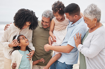 Image showing Beach, big family or happy grandparents with children in nature to enjoy holiday vacation in New Zealand. Travel, hug or proud father at sea or ocean with kids, care or mom to relax or bond together