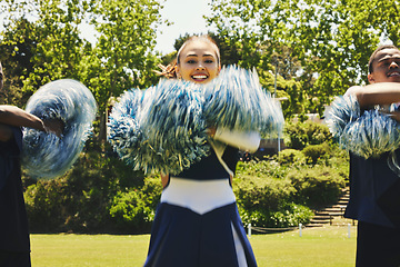 Image showing Cheerleader, dancing and field in teamwork in sport, fitness and energy at competition in team. Woman, men and diversity in balance for training, pom poms and college performance with collaboration