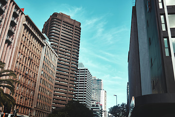 Image showing Cityscape, buildings or skyscraper with landscape for urban infrastructure or architecture outdoor in California. Development, town or skyline with city, tower and hotel with modern exterior or roof