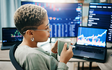 Image showing Trading, woman and coffee with investment, laptop and stock market with research, connection and internet. Person, investor or employee with a pc, economy or code with website information or espresso