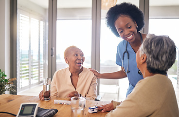 Image showing Doctor with senior women at table in nursing home for consultation, check up and conversation. Nurse, caregiver or medical professional with elderly patient in living room for advice, chat and care