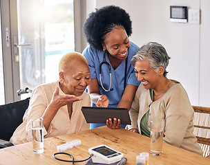 Image showing Tablet, smile and an assisted living nurse with old women in the kitchen of a retirement home for consulting. Technology, medical and an african caregiver showing information to patient friends