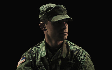 Image showing Man, soldier and war on black studio background, ptsd and patriotic in military, sad and depressed. Army, mental health issues and hero for country, service and duty with grief, thinking and veteran