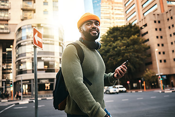 Image showing City, thinking and black man with a smartphone, smile and connection with social media, travel and internet. African person, mobile user and guy with cellphone, digital app and outdoor with ideas