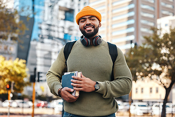 Image showing Portrait of man in city, university books and smile on morning commute to campus for education with backpack. Learning, studying and happy face of college student, urban street and school knowledge.