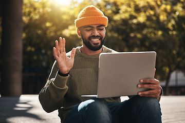 Image showing Student, laptop and video call outdoor for university, college and online education, e learning or scholarship interview on campus. African man with computer, waves hello and virtual class in a park