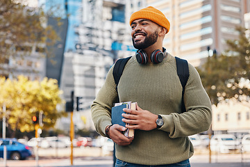 Image showing Student, thinking and backpack in city for education, learning or university and college travel outdoor. Young, african man with books, bag and walking to campus with study or scholarship opportunity