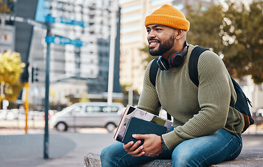 Image showing Happy man sitting in city with university books and smile on morning relax at campus for education with backpack. Learning, studying and college student waiting on urban street with school notebook.