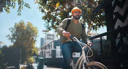 Image showing Bicycle, travel and man in city for journey, adventure and commute for weekend, holiday or vacation. Fashion, style and person on bike for eco friendly transport, carbon footprint and cycling in road