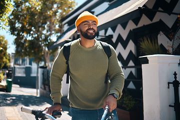 Image showing Bicycle, travel and man in city for walking, adventure and journey for weekend, holiday or vacation. Fashion, style and happy person on bike for eco friendly transport, exercise and cycling in road