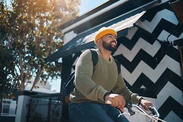 Image showing Bicycle, travel and happy man in city for commute, adventure and journey for weekend. Fashion, trendy clothes and person on bike for eco friendly transport, carbon footprint and cycling in road