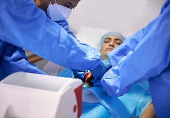 Image showing Heart, transplant and doctors team doing surgery or emergency operation for treatment or healing anatomy in hospital. Rescue, medical and professional surgeon or healthcare teamwork collaboration