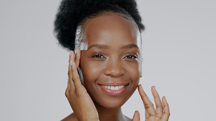 Image showing Face touch, skincare and happy black woman in studio isolated on gray background mockup space. Portrait, hands and natural cosmetics of African model in spa facial treatment, wellness or aesthetic