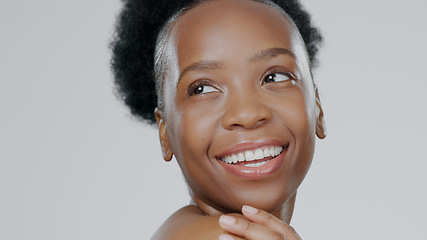 Image showing Face, skincare and beauty of black woman thinking in studio isolated on a gray background mockup space. Portrait, natural cosmetics and happy African model in spa facial treatment, wellness or health