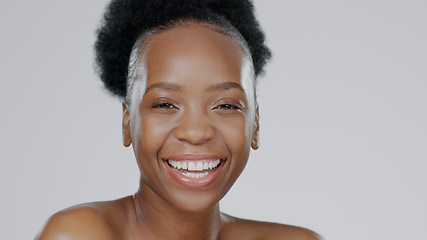 Image showing Face, skincare and beauty of excited black woman in studio isolated on a gray background mockup space. Portrait, natural cosmetics and African model in spa facial treatment, wellness and skin health