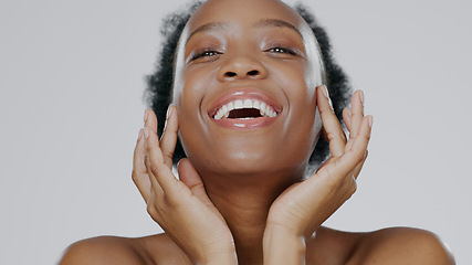 Image showing Black woman, portrait and beauty with skincare, facial with natural cosmetics on white background. Face, dermatology and African model with smile, moisturizer and treatment for skin glow in studio