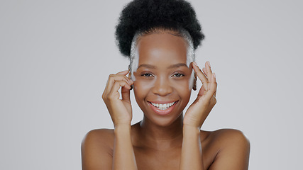 Image showing Face, skincare and hands of happy black woman in studio isolated on gray background for dermatology. Portrait, touch and natural beauty cosmetics of model in spa facial treatment, wellness or health