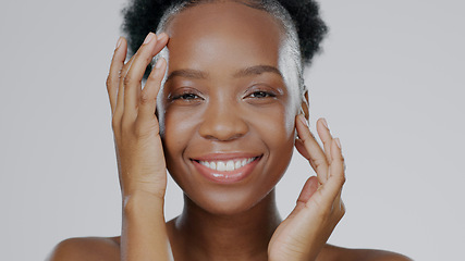 Image showing Face touch, skincare and beauty of black woman in studio isolated on gray background for dermatology. Portrait, hands and natural cosmetics of happy model in spa facial treatment, wellness or health