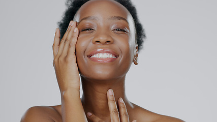 Image showing Touch face, skincare and beauty of black woman in studio isolated on gray background for dermatology. Portrait, hands and happy model in spa facial treatment, wellness or natural cosmetics for health