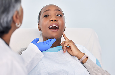 Image showing Dentist, patient and women at clinic, toothache with consultation and check mouth for dental and medical treatment. Oral hygiene, healthcare and orthodontics, tooth decay with cleaning for cavity