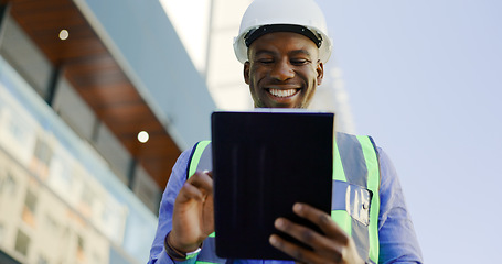 Image showing Engineering, man and tablet at construction site inspection, building development and industrial renovation. Excited or happy african worker on digital tech, design software or architecture planning