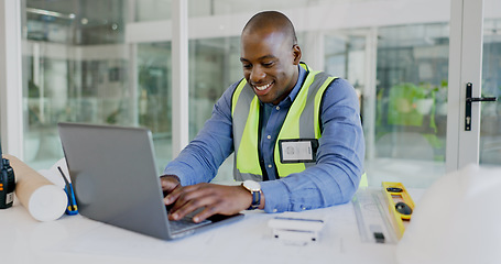 Image showing Laptop, smile and a black man construction worker in an office for planning a building project. Computer, typing and a happy young engineer in the workplace for research as a maintenance contractor