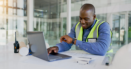 Image showing Laptop, time and a black man construction worker in an office for planning a building project. Computer, watch and a happy young engineer in the workplace for research as a maintenance contractor