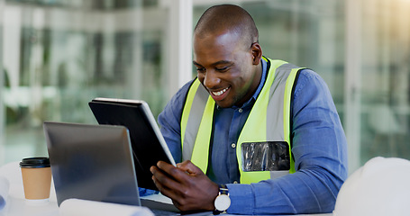 Image showing Tablet, laptop and a black man construction worker in an office for planning a building project. Technology, smile and a happy young engineer in the workplace for research as a maintenance contractor