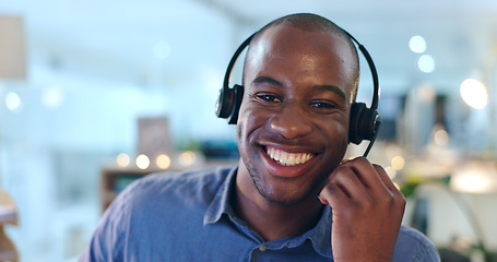 Image showing Call center, portrait and black man with smile at desk in office with pride, confidence and success in customer service. Businessman, face and happy with career in Kenya crm, b2b contact or support