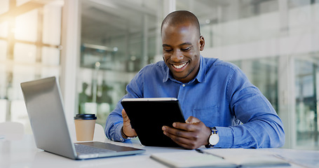 Image showing Laptop, tablet and happy with a business black man in the office for research on a company project. Computer, technology and smile young developer in a workplace for internet or software design