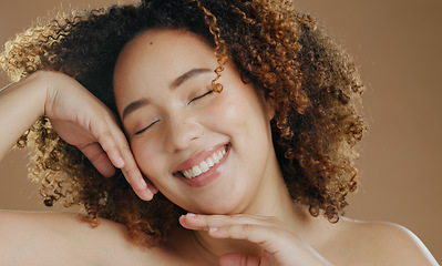 Image showing Happy model, natural beauty or smile for wellness in studio with confidence, eyes closed or skin glow. Face, proud woman or healthy biracial female person with skincare results on brown background