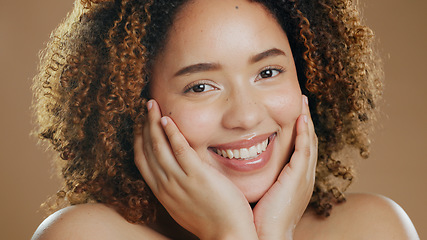 Image showing Portrait of happy woman, smile or healthy skin for wellness in studio with beauty, facial results or glow. Dermatology, natural or confident biracial model with skincare cosmetics on brown background